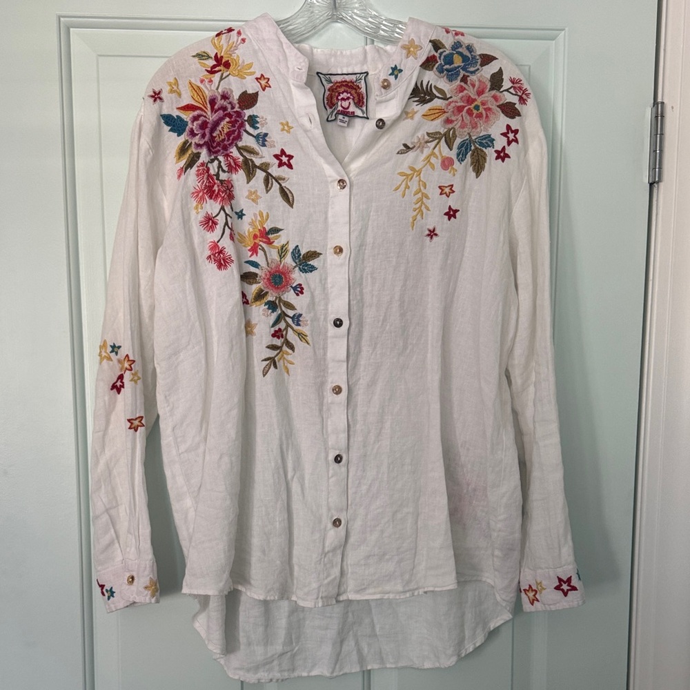 Absolutely gorgeous button-down from Jonny was white linen with floral design